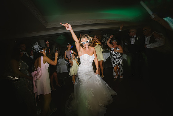 bride-partying-at-wedding-at-aston-hall-hotel-sheffield