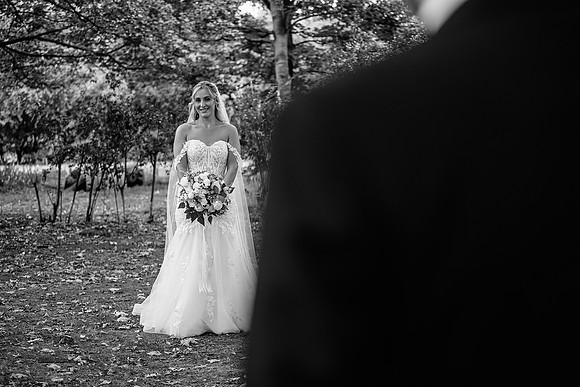 bride-looking-at-groom-blackandwhite-wedding-photography-aston-hall-hotel-rotherham-yorkshire