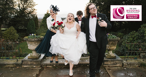 bride laughing with bridal party at wortley hall sheffield wedding