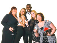 Party guests having fun in photobooth at christmas party in sheffield