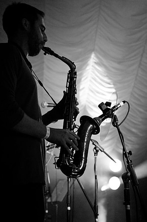 saxophonist playing at bakewell acoustic festival in derbyshire
