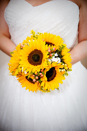 Bride with Sunflower wedding bouquet at Losehill House Hotel in Derbyshire