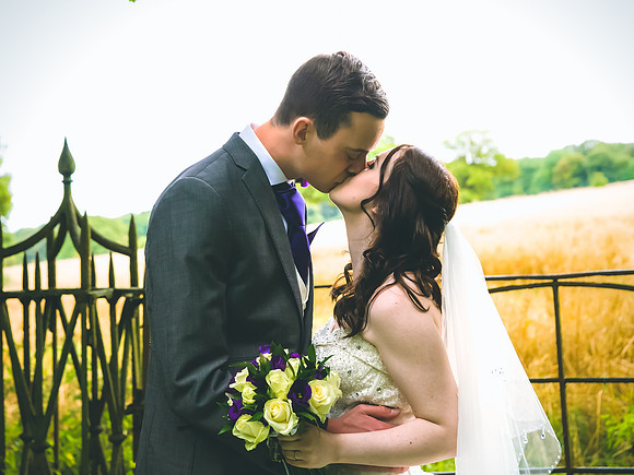 Wedding kiss at Wortley Hall near Sheffield by wedding photographer Dan Mogan Photography