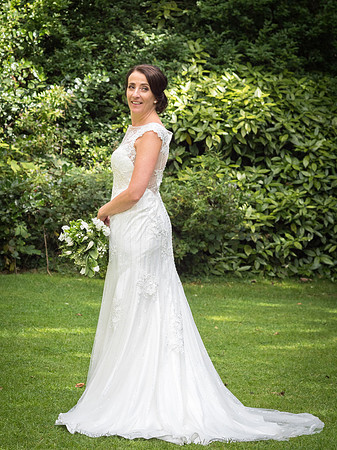 Bride in gardens of Mosborough Hall by wedding photographer Dan Mogan Photography