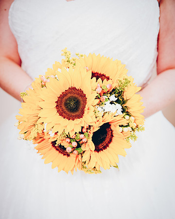Bride with Sunflower wedding bouquet at Losehill House Hotel in Derbyshire