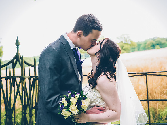 Wedding kiss at Wortley Hall near Sheffield by wedding photographer Dan Mogan Photography