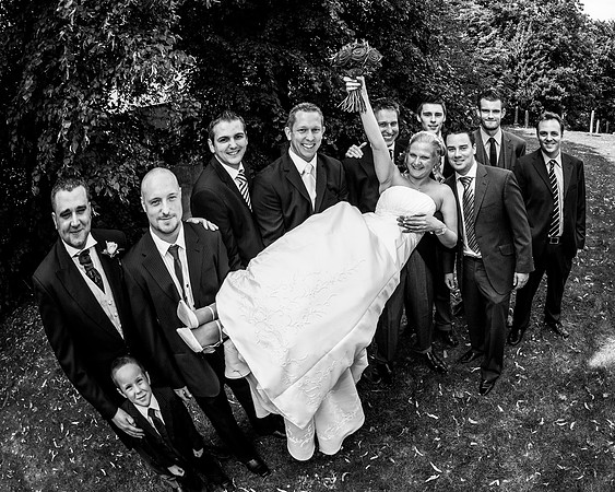 Bride held aloft by ushers at rotherham wedding