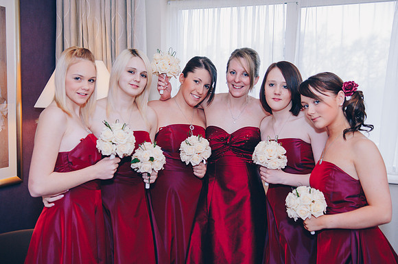 Sheffield wedding photography of bridesmaids in red dresses