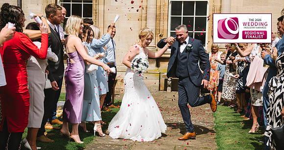 normanby-hall-scunthorpe-wedding-photography-of-bride-and-groom-with-confetti