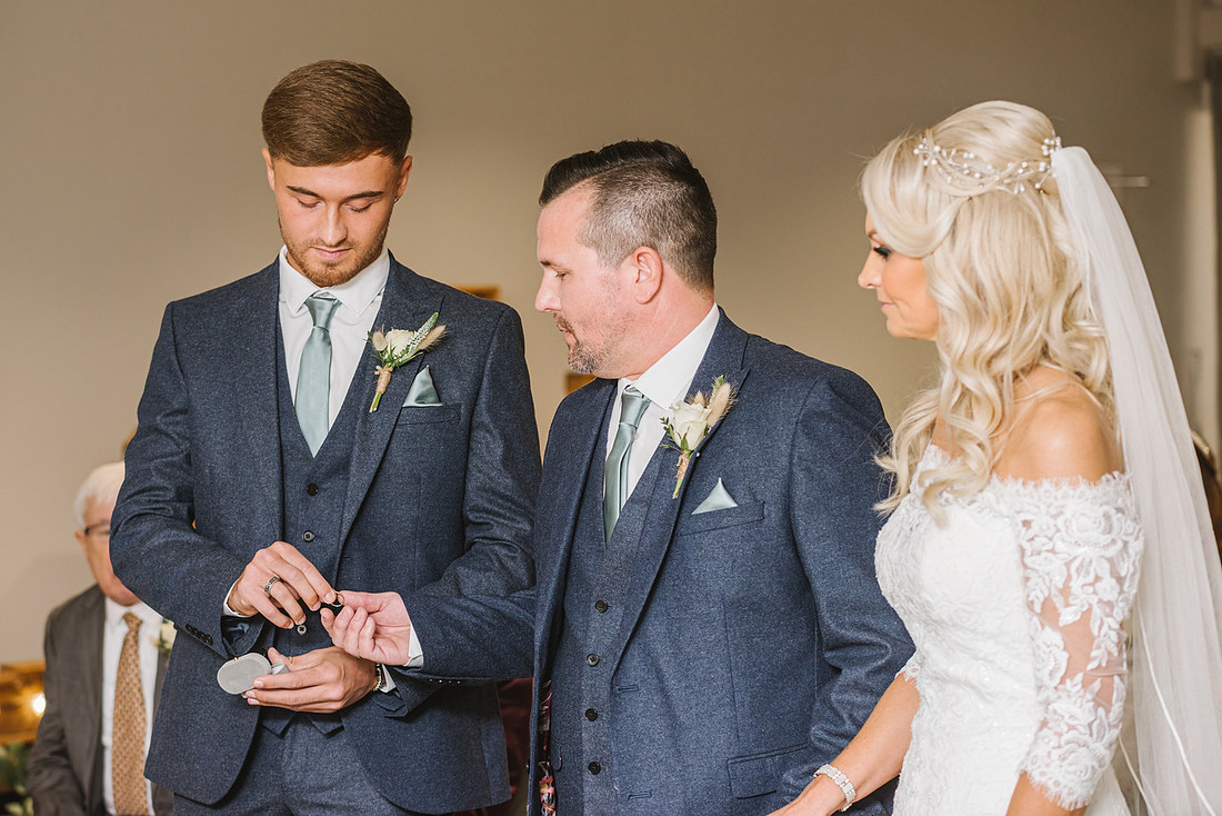 Wedding photo of rings at wedding ceremony at aston hall hotel in sheffield
