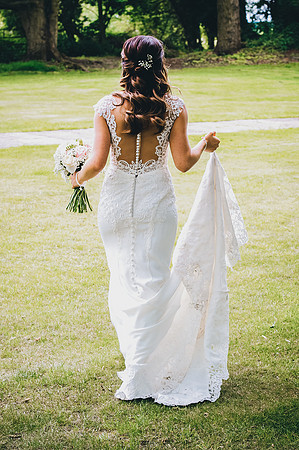 bride walking in her wedding dress at aston hall hotel in rotherham