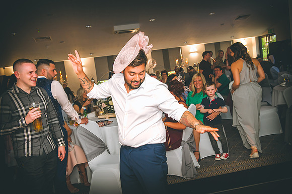 guest dancing at wedding reception at aston hall hotel in south yorkshire