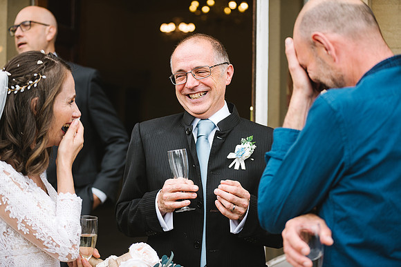 reportage-wedding-photography-at-wortley-hall-in-sheffield-of-wedding-guest-smiling-candid