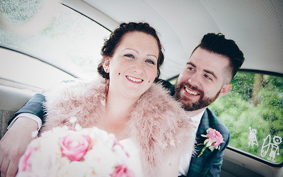 bride and groom arriving at wedding reception in leeds