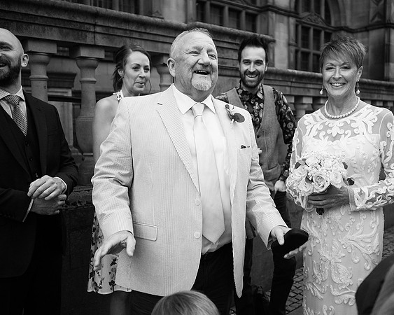 groom and wedding guests outside sheffield town hall