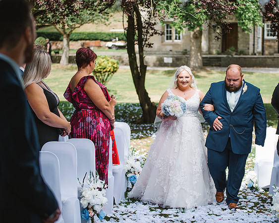 nottinghamshire-documentary-wedding-photograph-of-bride-walking-down-the-aisle-at-the-old-vicarage-at-elkesley