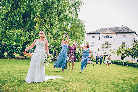 wedding photography of bouquet toss at hotel van dyk by wildes in clowne