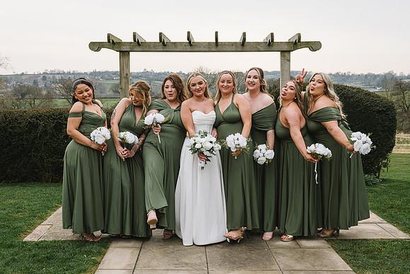 bridesmaids-posing-at-shottle-hall-belper-wedding-derbyshire