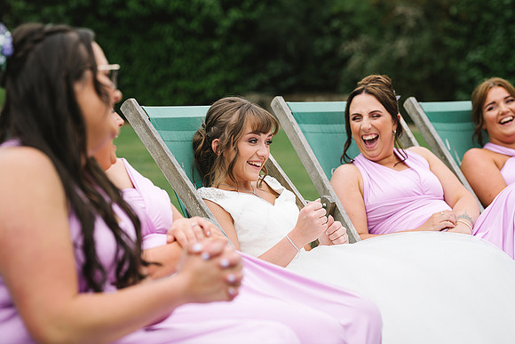 bridesmaids-laughing-at-bagden-hall-yorkshire-wedding