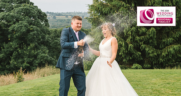 Wedding-Photography-champagne-spray-bagden-hall-huddersfield-yorkshire